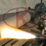 Hot spraying of metallic powder